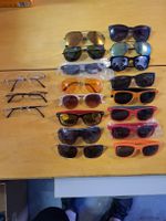 16 Sonnenbrillen und 3 Brillen mit Korrektur