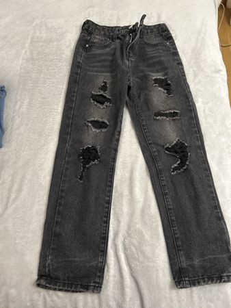 Jeans grigi strappati tg 140