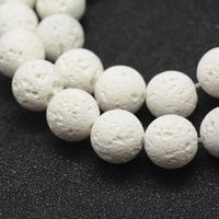 Lava Perlen 6mm weiss, ungewachst (roh) 1 Strang