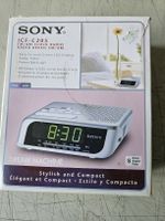 FM/AC CLOCK RADIO,ab 9-.