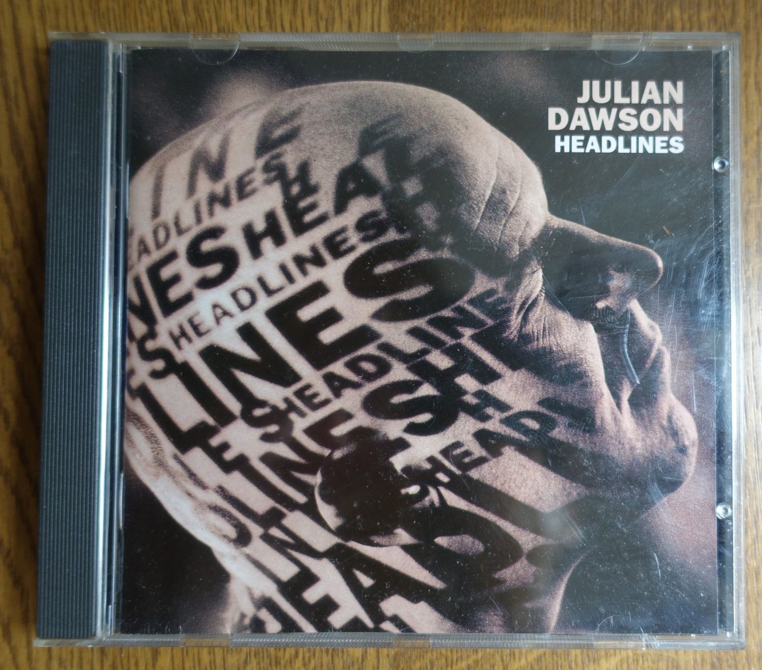 CD: Julian Dawson – Headlines - D25 – Usato da Sessa venduto da discoverymedia