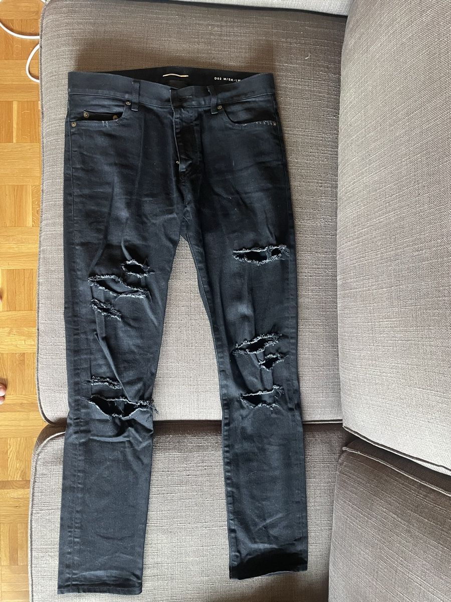 Saint Laurent Jeans: Jeans noir Yves Saint Laurent – Usato da genève venduto da champanonono