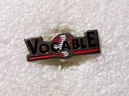 Ansteckpin 82: Vocable