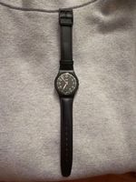 Montre Swatch noire bracelet cuir
