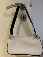 À vendre sac Lacoste très bon état