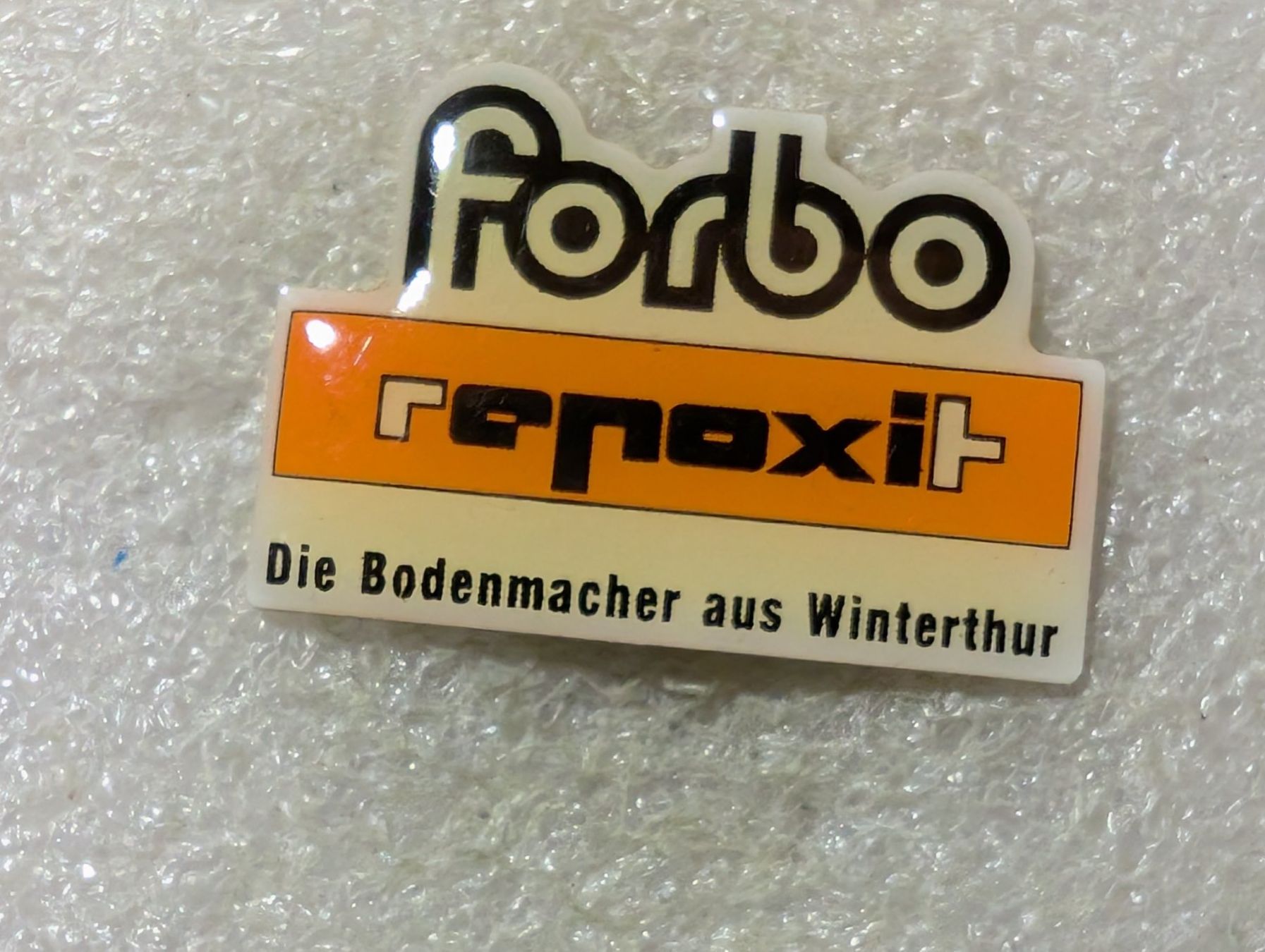 Placchette & Badge: Ansteckpin 83: Forbo – Usato da Oppligen venduto da Pin-Fall-Shop