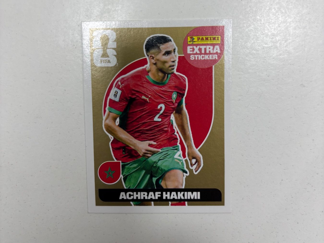 Panini Sammelbilder & Trading cards: Panini Extra Sticker Achraf Hakimi Gold World Cup 2026 – Gebraucht aus Pregassona von Roby17 1
