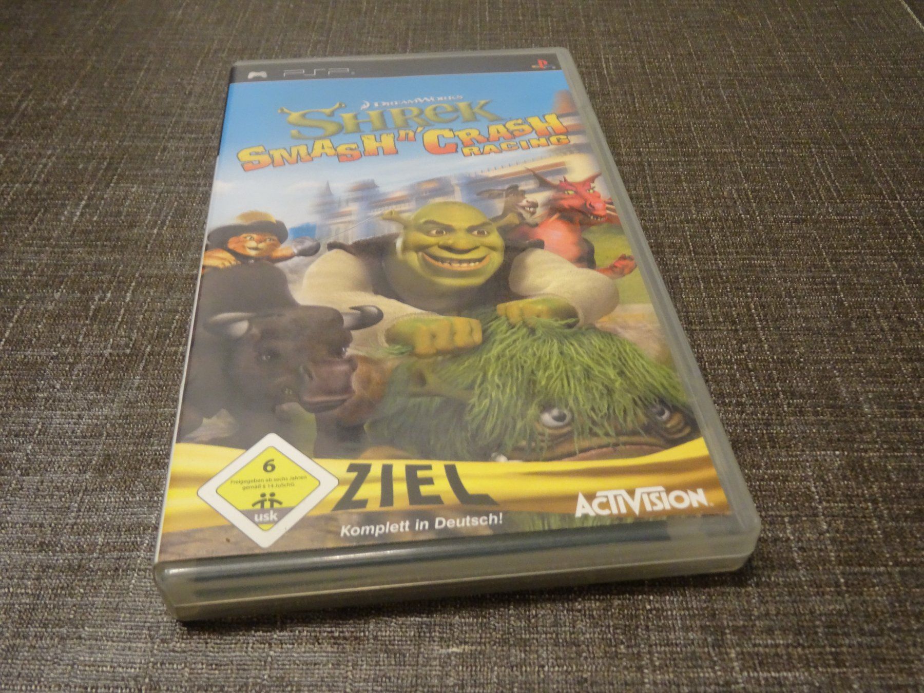 Sony Giochi: Shrek Smash n Crash Racing PSP – Usato da Olten venduto da Disc-Ausverkauf
