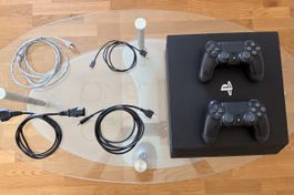 Playstation 4 Pro mit Controller und Zubehör