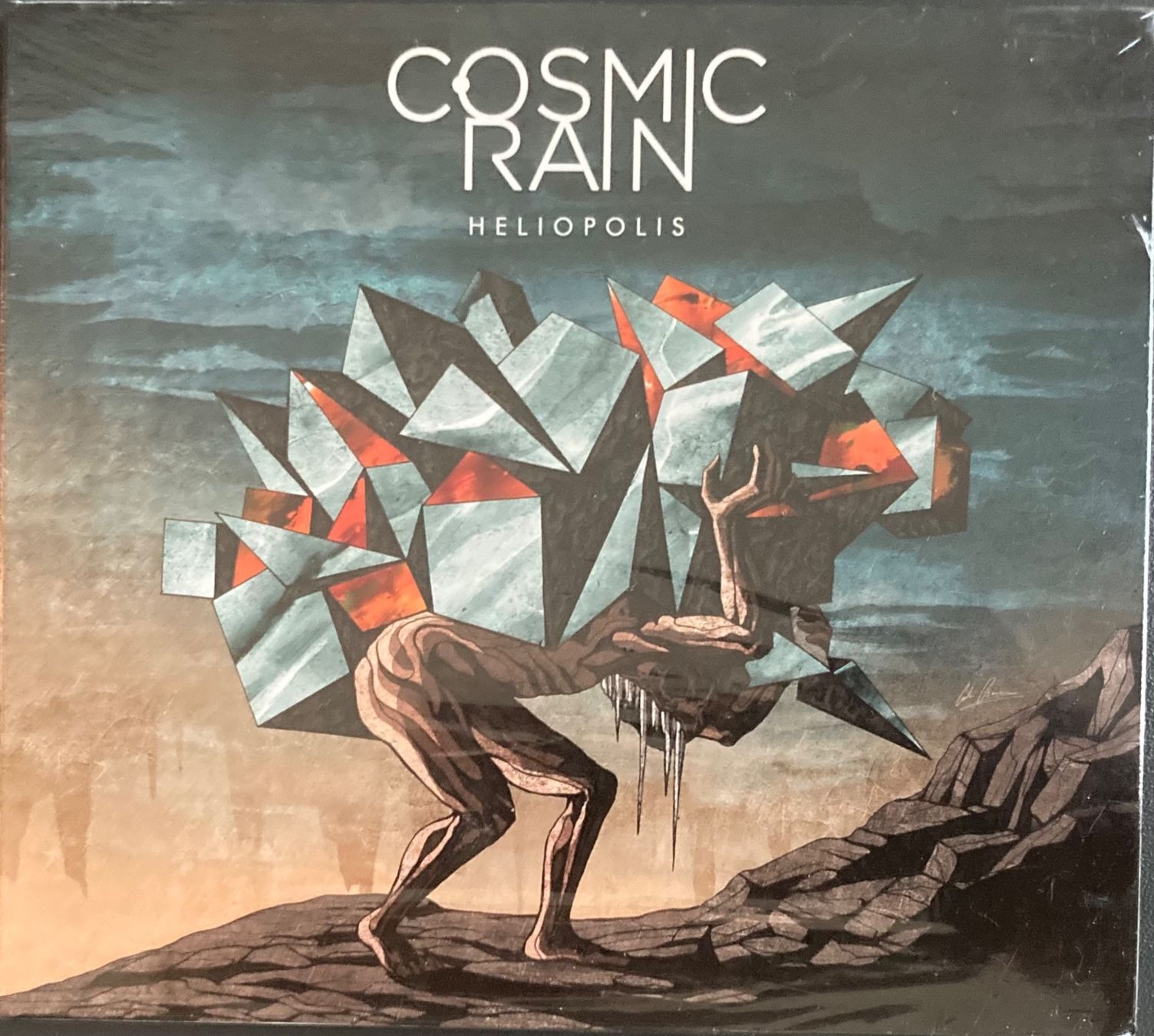 CDs: COSMIC RAINS - HELIOPOLIS – Neuf avec emballage d'origine à Poliez-Pittet par Newtown-Records