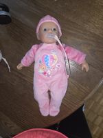 Baby-Puppe Lovely Day in rosa Strampler mit Schnulli