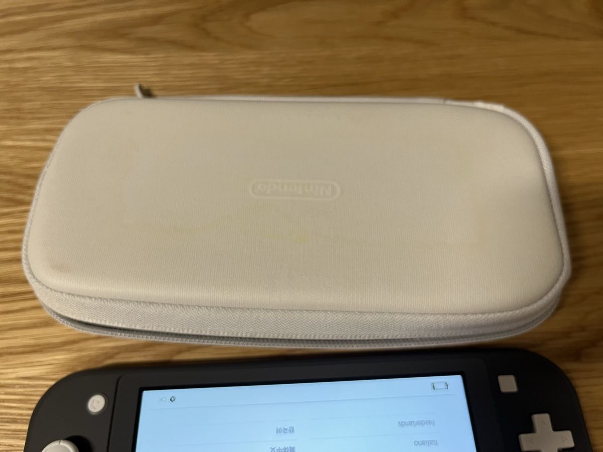 Nintendo Console: Nintendo Switch Lite Grau mit Etui Case – Usato da Olten venduto da T.Frei 7