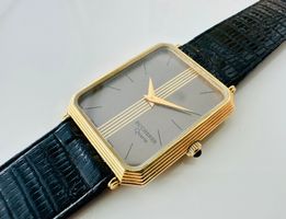 BUCHERER Quartz 30x26 mm en bon état, bracelet et pile neufs
