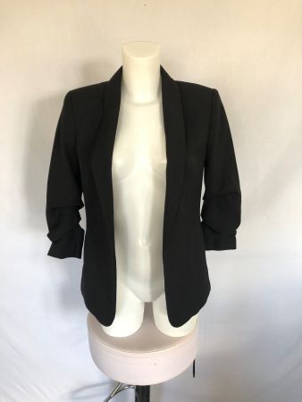 Veste noire H&M manches accordéon taille 34 comme neuve