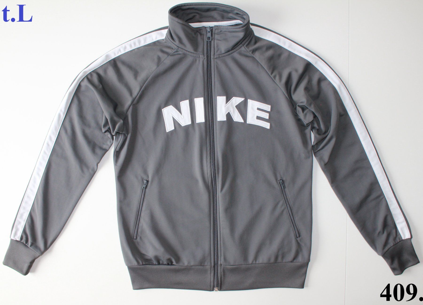 Nike Giacche: Veste de sport Nike grise – Usato da Peseux venduto da Gilloss