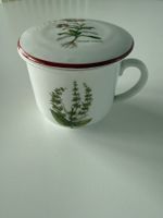 Alte Teetasse mit Sieb