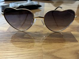 Lunettes à soleil neufs de marque
