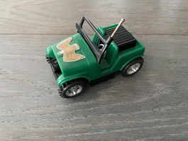 Vintage Stehauf-Jeep batteriebetrieben