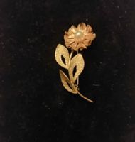 Broche 0r 9carats avec une perle