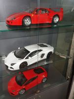Ferrari und zwei Lamborghini