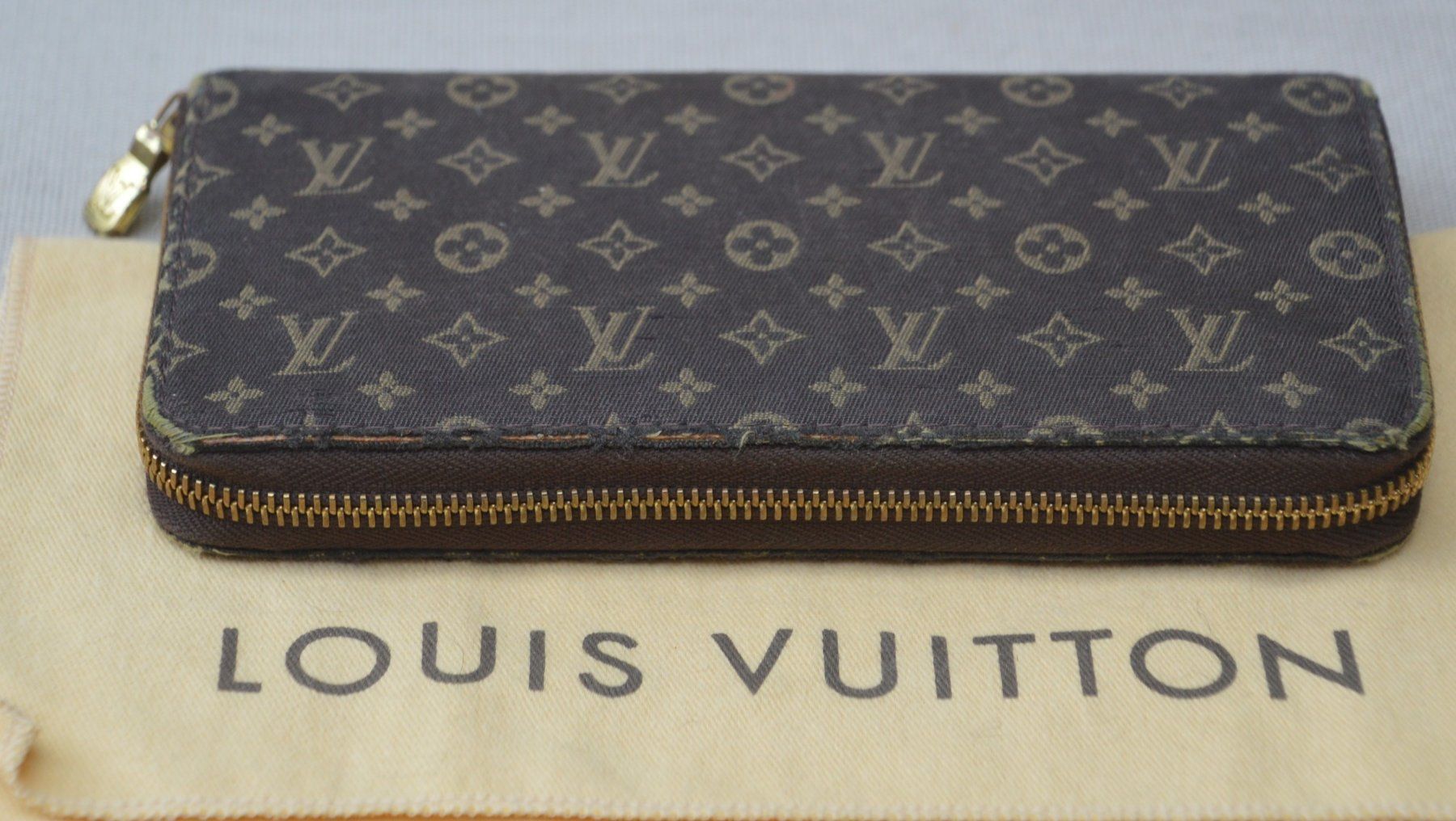 Louis Vuitton Portamonete: Louis Vuitton Ebene Monogram Mini Lin Zippy Wallet – Usato da Collonges venduto da arashee 4