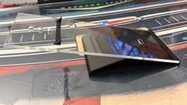 Display case for model cars, clear acrylic, black base