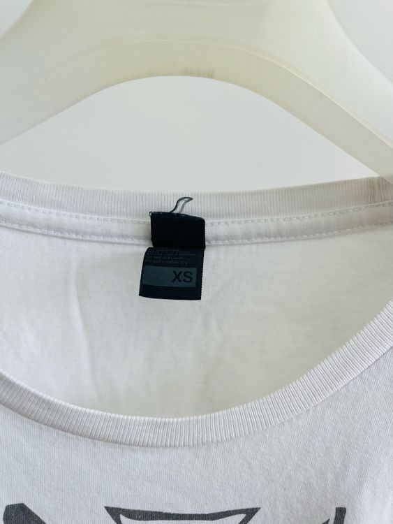 T-shirt: T-shirt d'été Byron Bay, taille XS, parfait pour la plage! – Usato da neuchatel venduto da Global.P 1
