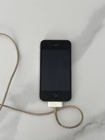 iPhone 4 Schwarz mit starken Gebrauchsspuren