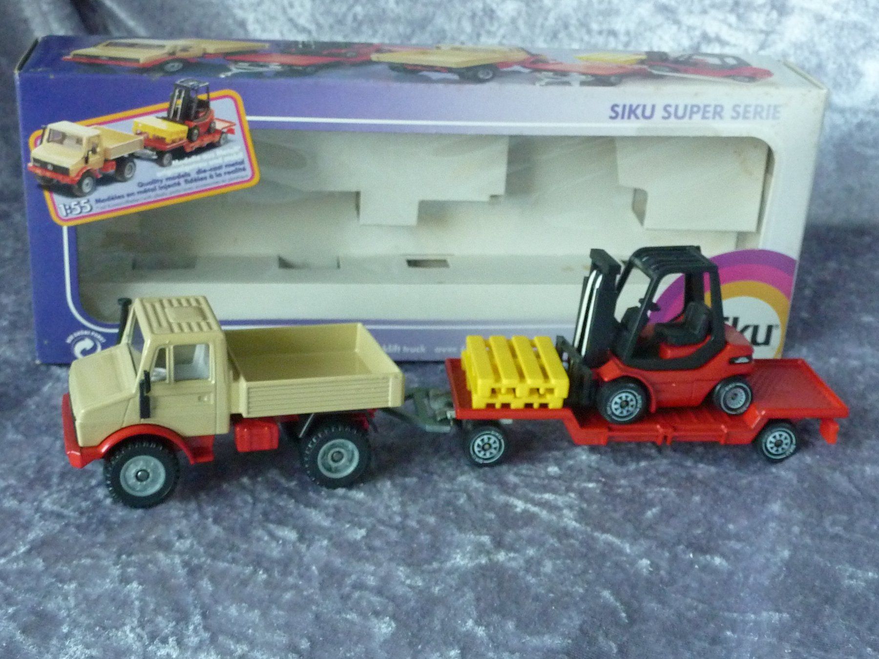 Siku Modellini d'auto: Unimog U1500 mit Gabelstabler Siku2522 – Nuovo (secondo la descrizione) da Dürrenäsch venduto da modellautos4you