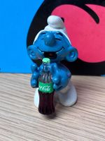 Schlumpf mit Cola-Flasche
