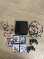 PlayStation 4 mit Spielen und 2 Controllern