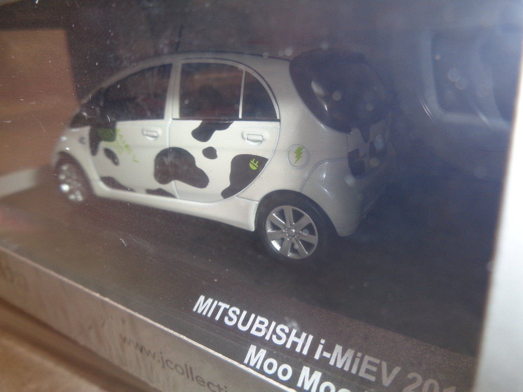 Mitsubishi Modellini d'auto: Jcollection 1:43 Mitsubishi I-Miev 2012 Moo Moo – Nuovo e nell'imballaggio originale da Reconvilier venduto da rallycar 1