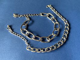 2 Armbänder Panzerarmband silbrig