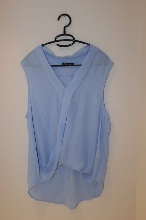 ab Fr. 1.- Bluse hellblau ärmellos