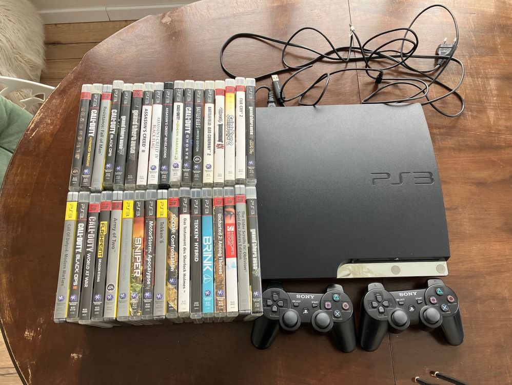 PS3 Slim mit 34 Spiele Kaufen auf Ricardo