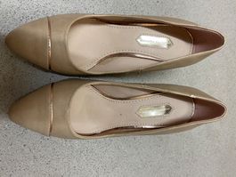 New low heel beige pumps
