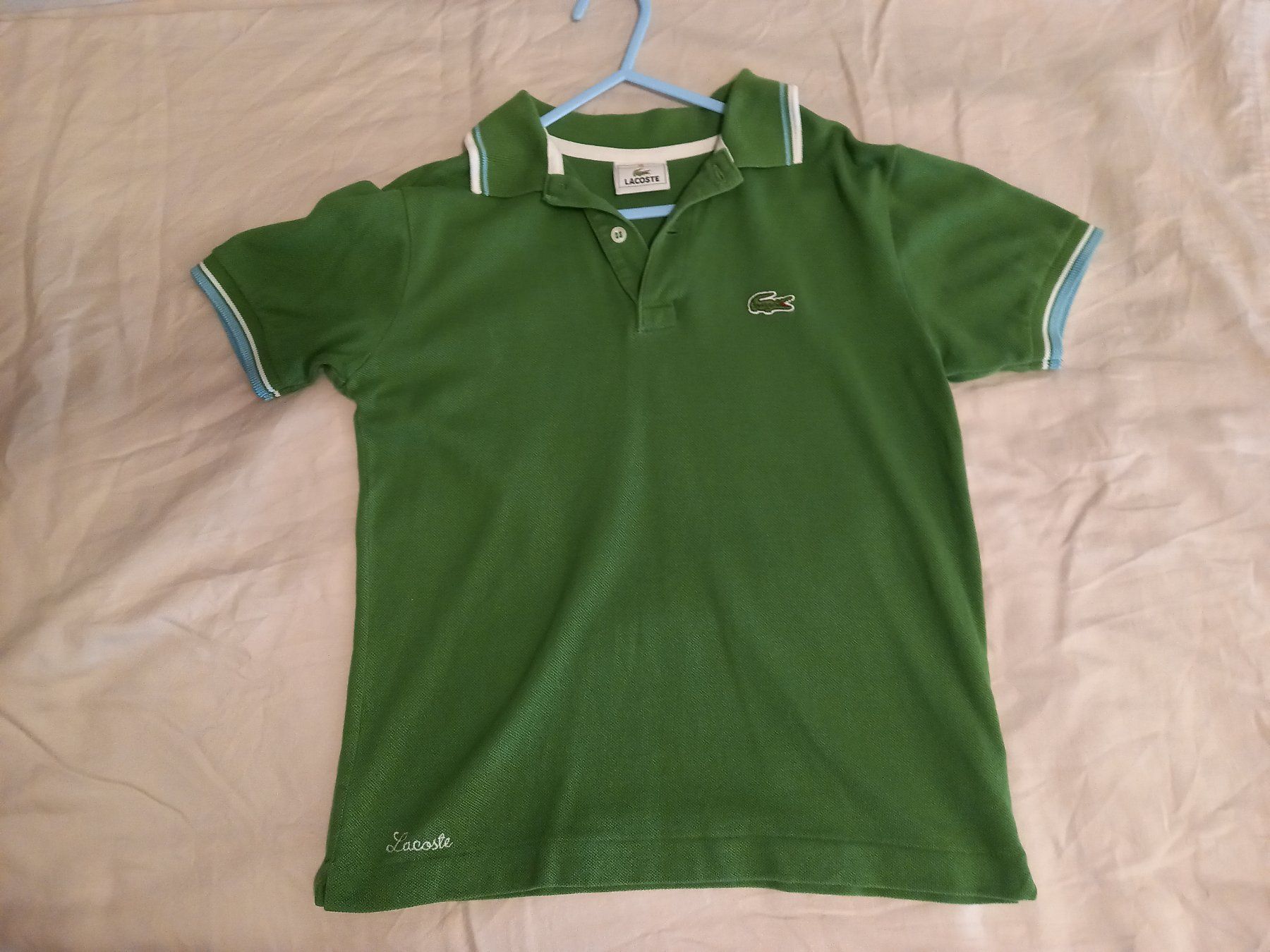 Chemises, T-shirts & Polos: Polo Lacoste vert taille 10 bon état – D'occasion à Lausanne par KUNKI-DESTOCK