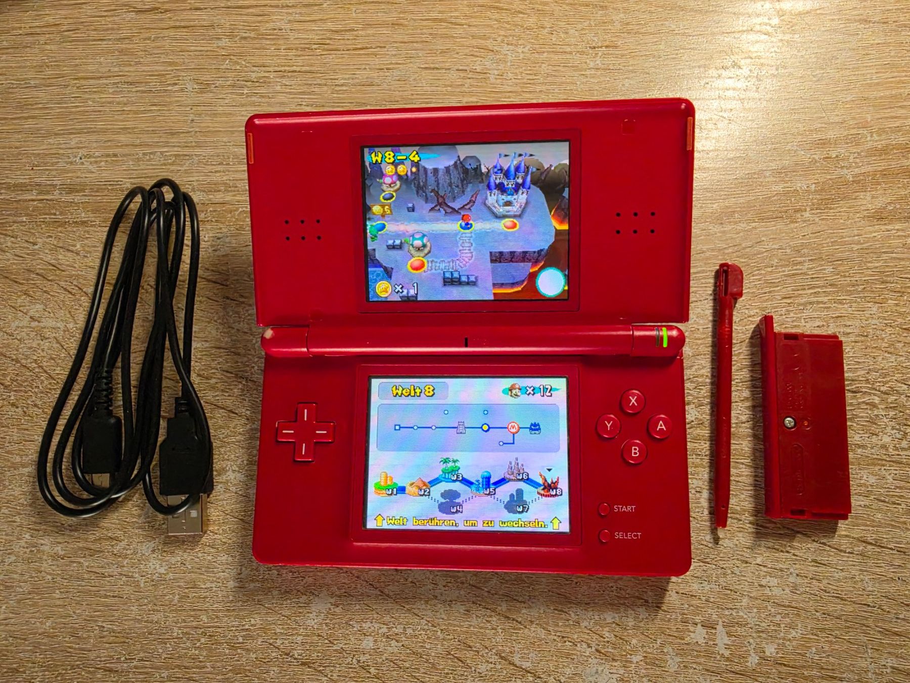 Nintendo Konsolen: Nintendo DS lite in rot – Gebraucht aus Sempach von Knuckles17