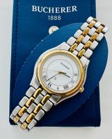 BUCHERER Quartz 33 mm bicolore en bon état, pile neuve, étui