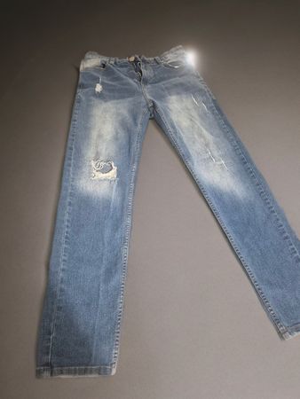 Jeans blu strappati Taglia M, in buono stato