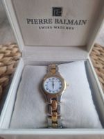 Montre Pierre Balmain femme bicolore occasion