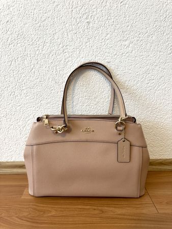 Elegante Coach Handtasche – Perfekt für den Sommerlook!