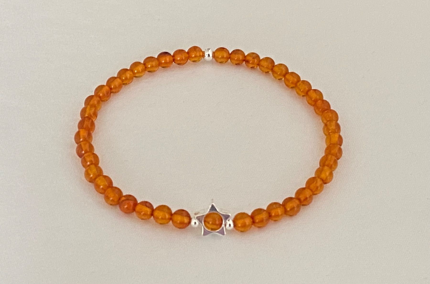 Bracciali & Braccialetti: Edelstein Armband Bernstein mit Silber auf Mass – Nuovo e nell'imballaggio originale da Zuzwil SG venduto da Lemliskat