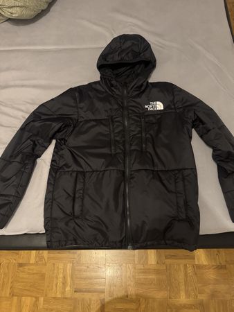 Doudoune fine The North Face noire, chaude et impeccable!