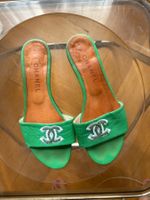 green vintage chanel slides