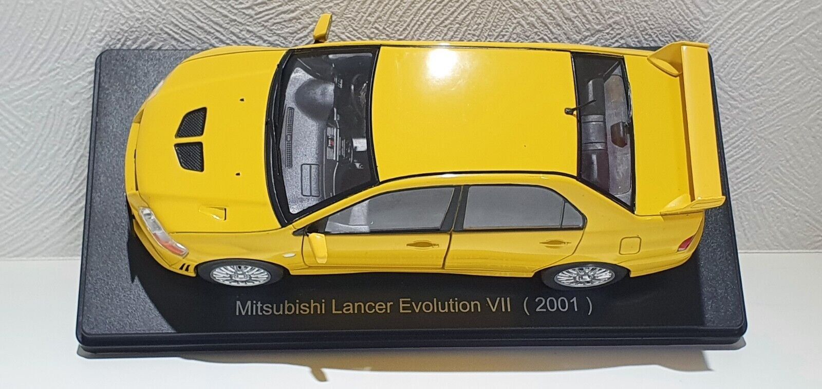 Mitsubishi Modellautos: Mitsubishi Lancer Evolution VII 2001-2004 RHD gelb      1:24 – Neu und originalverpackt aus Gerlafingen von espero88 6