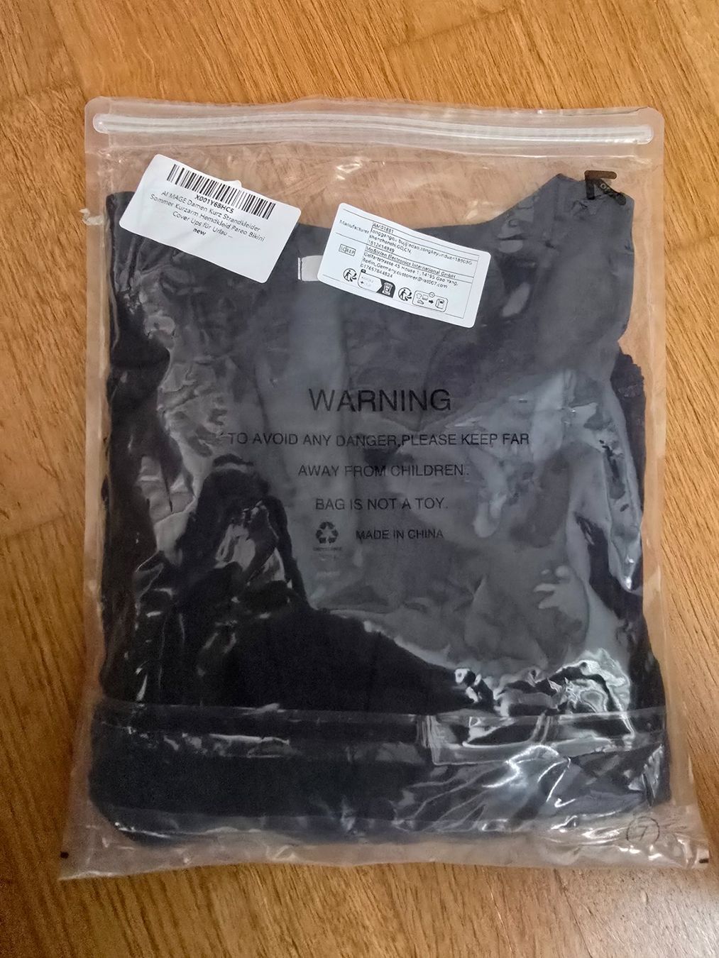 Kleider: Damen Strandkleid "AI'MAGE" – Neu und originalverpackt aus Rafz von Domimir 3