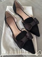 Schwarze Ballerinas mit Schleife