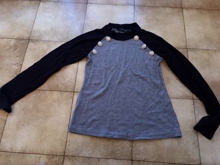 Pull gris et noir taille M