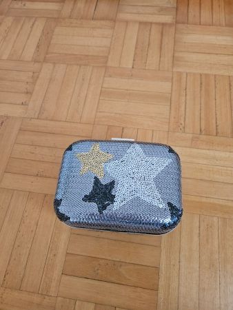 Glitzernde Clutch mit Sternen - Perfekt für den Ausgang!